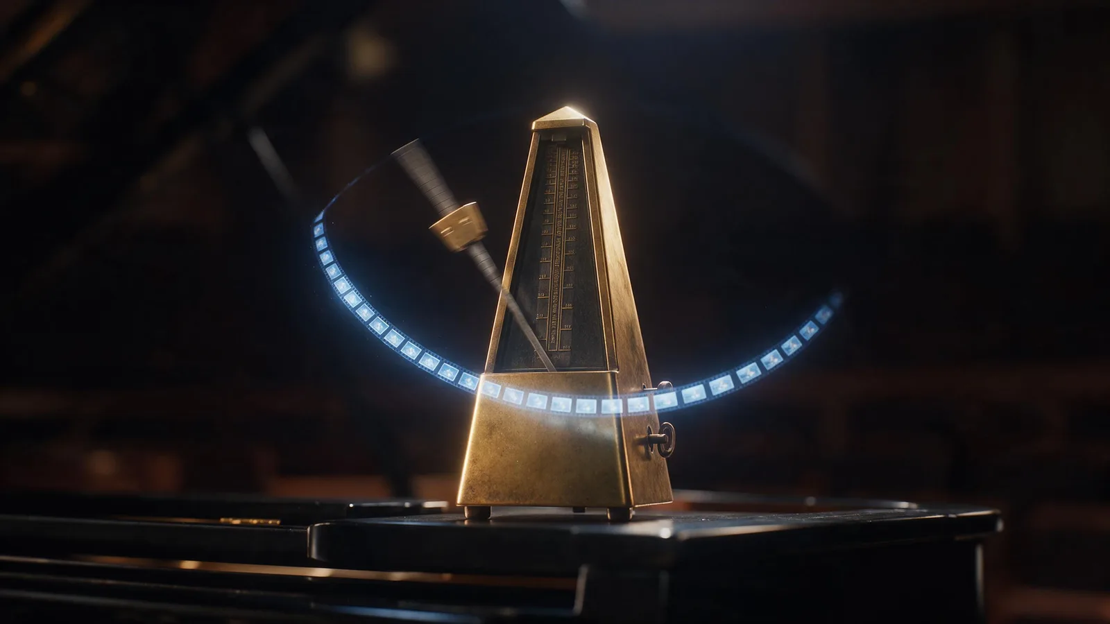 A brass metronome on a black piano lid, its pendulum leaving an arc of glowing film frames